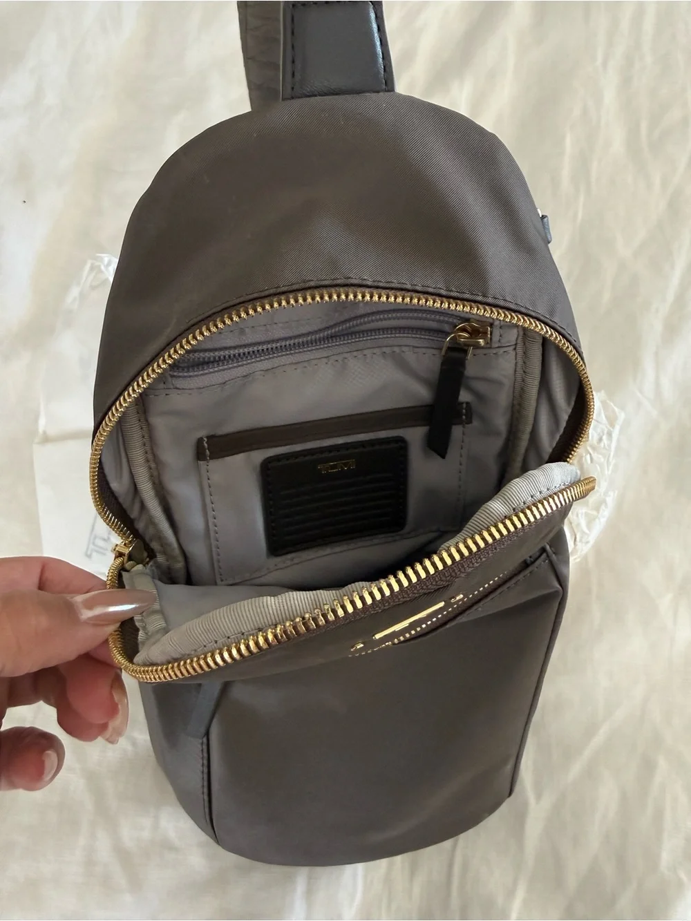Tumi compact sling
